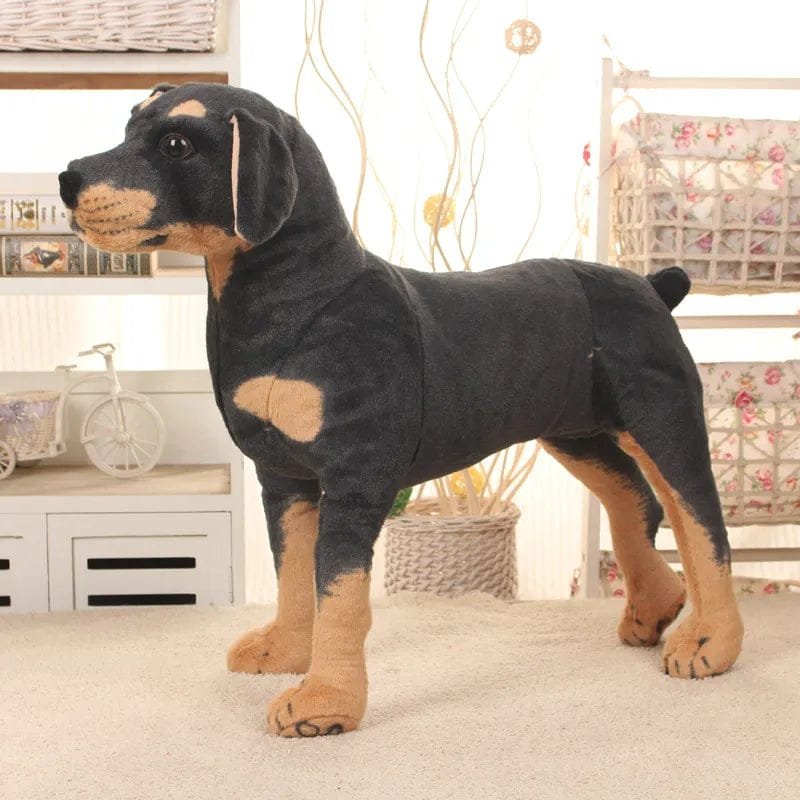 Stuffed dog toy resembling a Rottweiler.