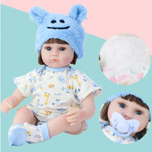Reborn baby doll in a blue bear hat with pacifier and soft body for lifelike role play and bedtime snuggles.