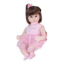 Reborn baby doll in a pink dress with bow, soft and cuddly at 42cm for dress-up play and sleepy-time hugs.