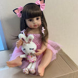 Doll in a pink outfit with a bunny plush toy