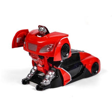 Red and black electric wall and ceiling anti gravity RC car for indoor stunt driving and play.