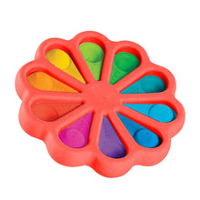 Colorful flower shaped push pop bubble sensory toy with red border for calming play.