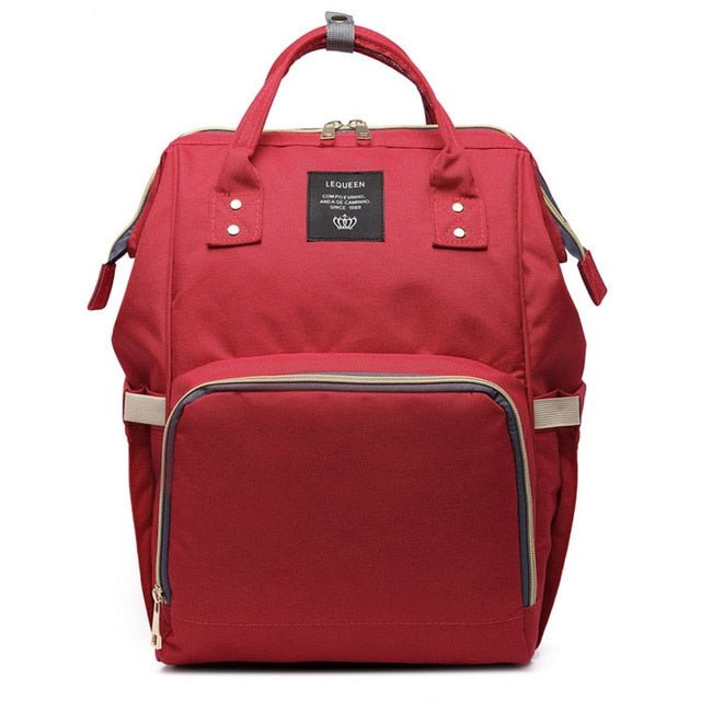 Red diaper bag weekend trip view showcasing large capacity for mommy baby essentials.