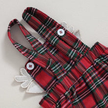 Red and green plaid baby skirt with white buttons for Christmas outfits and festive toddler dressing.