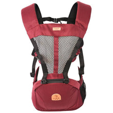 Red hipseat baby carrier with black straps for ergonomic infant support during everyday carrying.