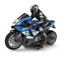 Red 1:10 scale RC motorcycle with rider figure for off-road racing play and hobby collecting.