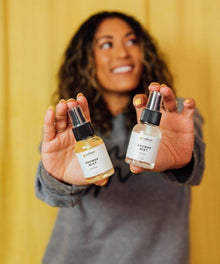 Refreshing Shower Mist Duo pack held for spa-style shower rituals, self-care gifting, and everyday relaxation.