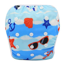 Beach print reusable baby swim diaper, a waterproof toddler swim pant for seaside trips and summer water play.