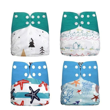 Four colorful baby diapers with different patterns 