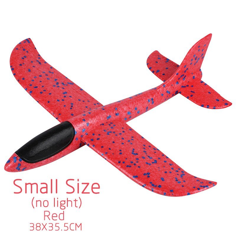 Red toy airplane with blue speckles