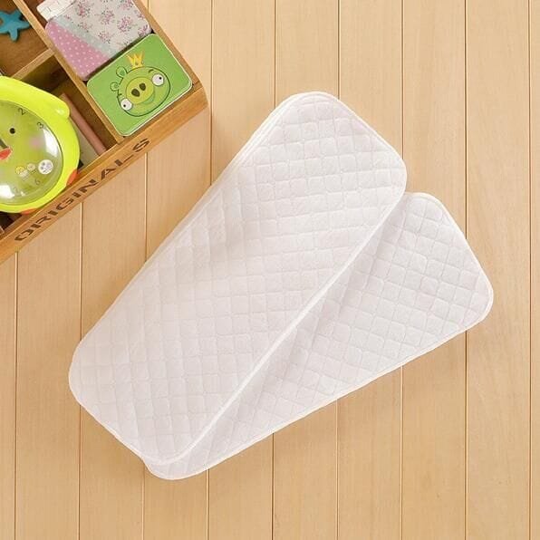 Washable Reusable Nappies changing mat quilted pad for hygienic nappy changes on floors and travel surfaces.