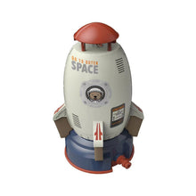Rocket space ship water sprinkler toy, a simple summer garden activity that keeps children cool and active.