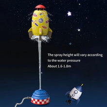Rocket water sprayer toy against a starry sky graphic, a space-themed splash toy for garden and park play.