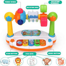 Diagram of the piano toy labeling the Ferris wheel, rotating bell, rotating windmill, star button, five keys and music button