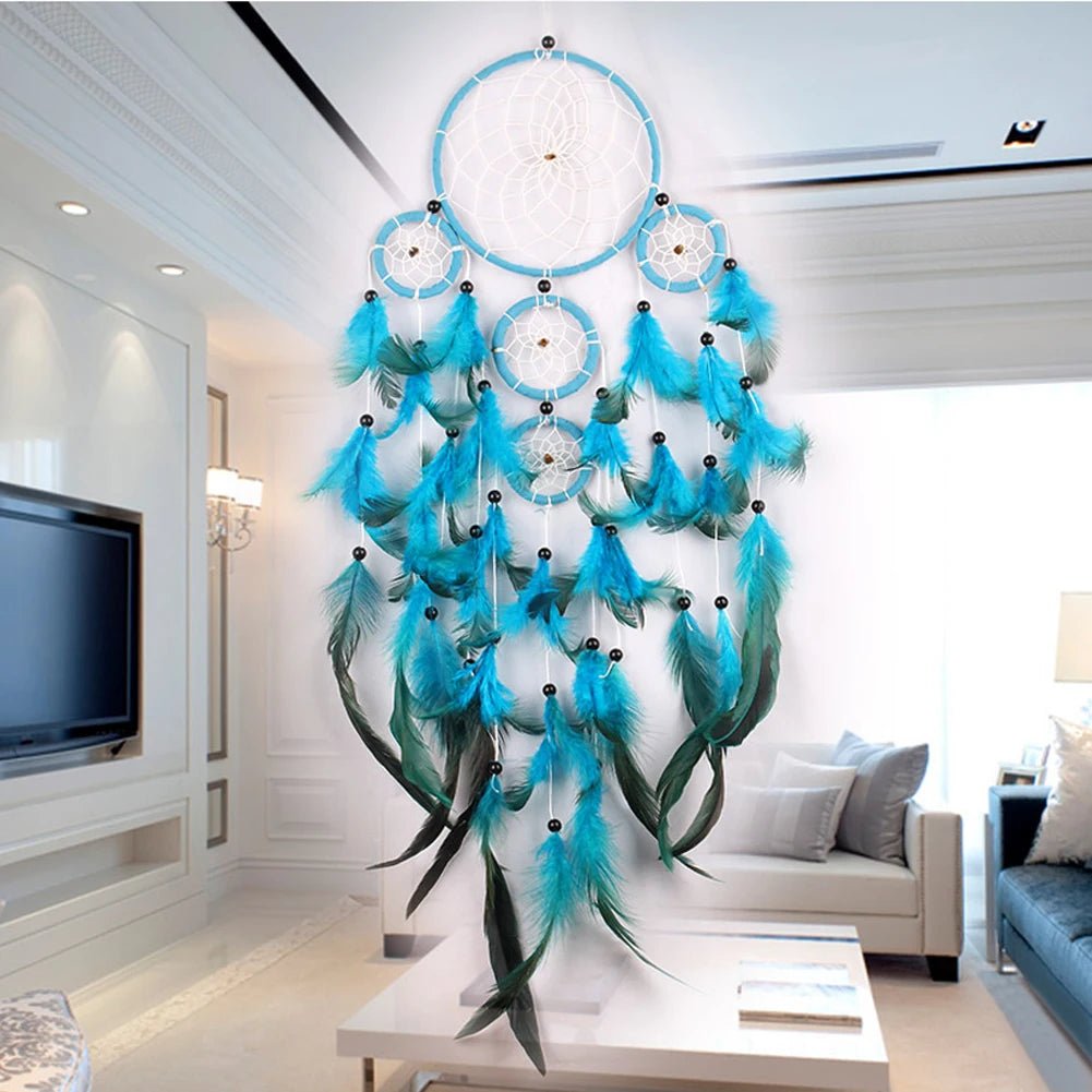 Rustic blue and green feather dream catcher styled in a modern living room for wall art.