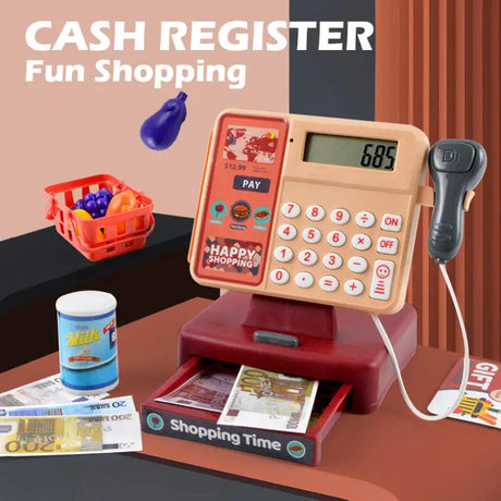 Toy cash register with accessories on a table, labeled 'Cash Register Fun Shopping'.