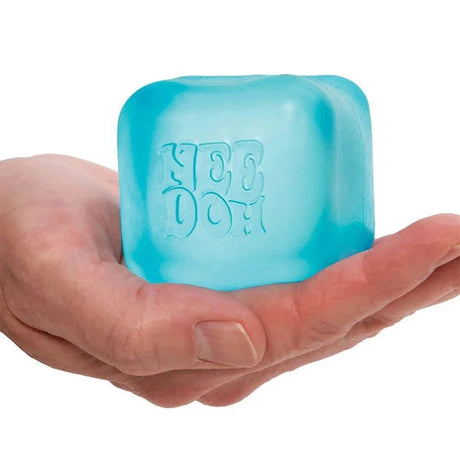 Blue ice cube tray held in a hand with 'YEE DOH' branding.