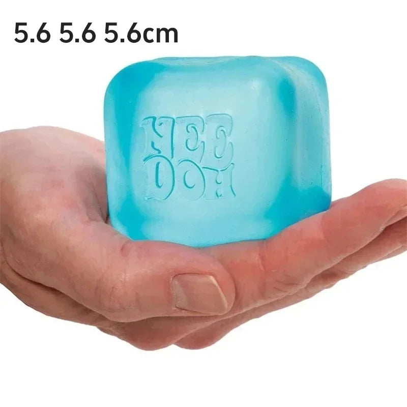Blue cube with 'YEE DOH' branding held in a hand, showing size of 5.6cm.