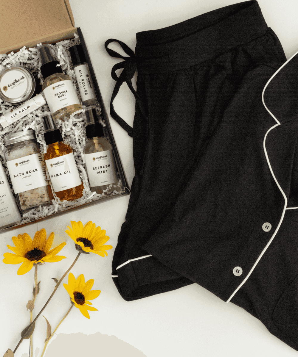 Self Care Night Bundle with a black pajama set and bath products for relaxing evenings, unwinding at home, and restful bedtime routines.
