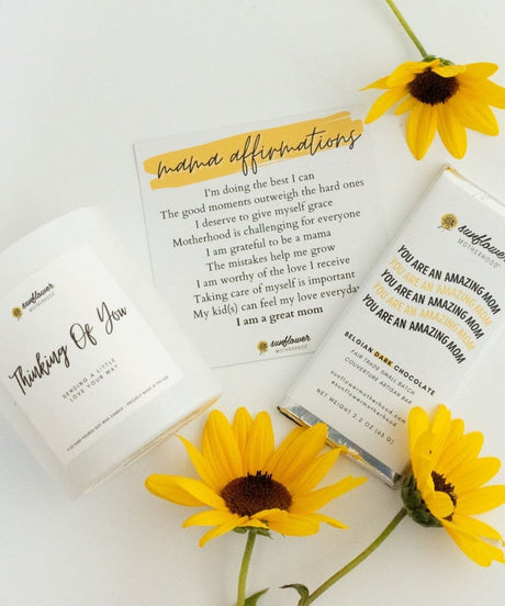 Sunflower-themed products, including a card,a  chocolate bar, and a sunflower 