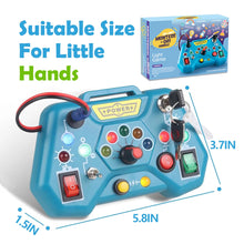 Toy control panel with colorful buttons and switches.