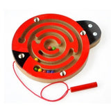 Wooden labyrinth toy with red rim and colorful balls.