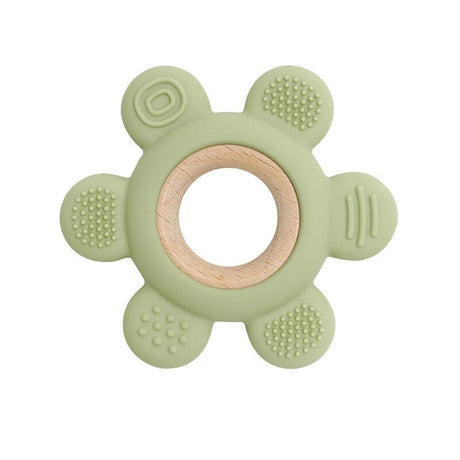 Green teething ring with wooden center.