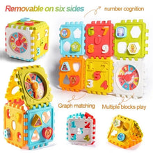 Shape fitting puzzle block toy with number patterns for baby cognitive play.