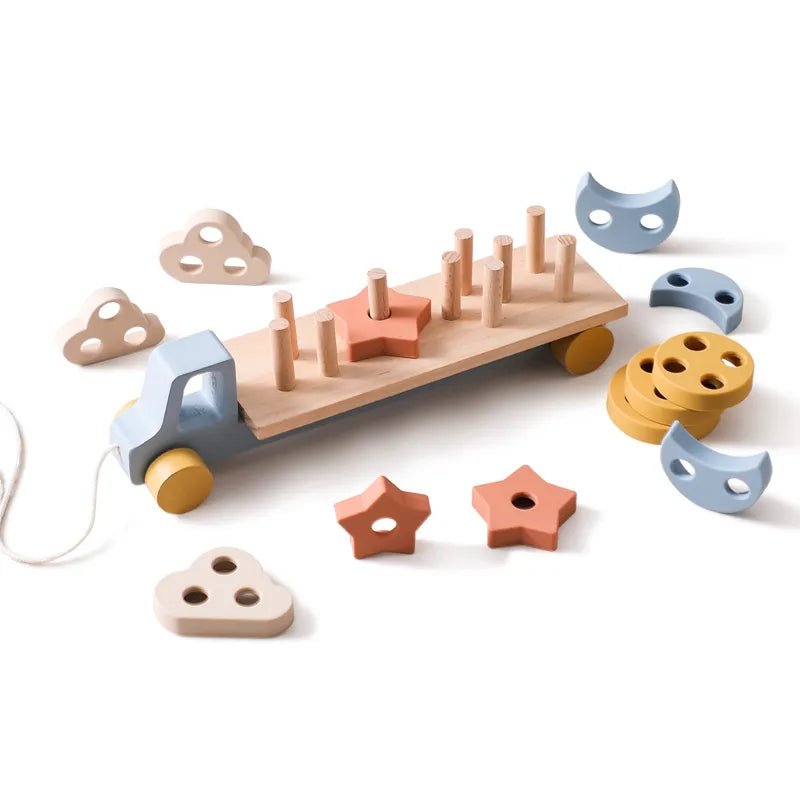Montessori wooden train and trolley play toy featuring a built-in shape sorter with colorful geometric pieces.
