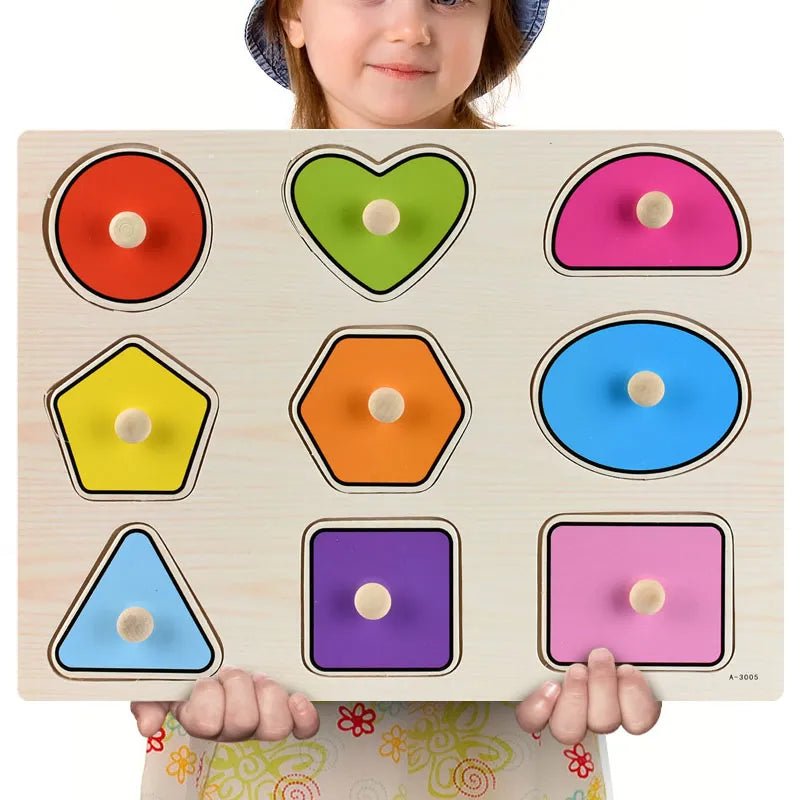 Child holding a Montessori wooden shape sorting puzzle board for educational play and color recognition.