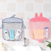 Shark and bunny mesh bath toy storage bags hanging on a wall for organized bath time.