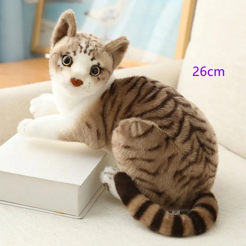 Lifelike Siamese American Shorthair Plush Cat sitting on a surface for gifting cat lovers.