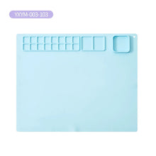 Light blue silicone mat with various shapes. (option 2)
