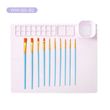 Set of paintbrushes with blue handles on a white tray, labeled 'YXYM-003-302'.