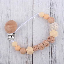 Style three of the silicone teether and pacifier clip, a newborn gift for teething relief and secure dummies.