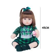  Doll in green outfit with 'Notty by nature' text, holding a pink pacifier
