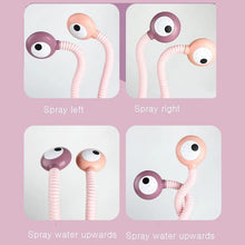 Snail bath toy adjustable spray nozzles for directing water gently during rinsing and playful tub games.