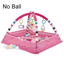 Pink baby play gym with toys.