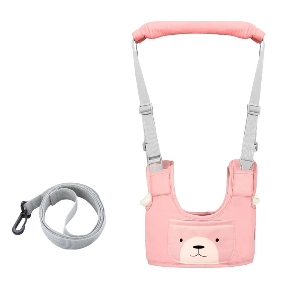 Pink baby harness with bear face design and gray leash 