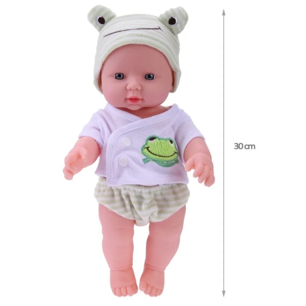 Soft Body Reborn Baby Doll in a frog-themed outfit and hat with size label for choosing the right doll size.
