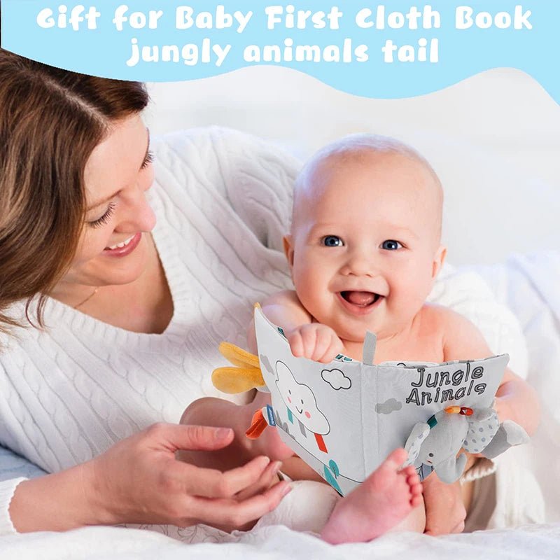 Soft cloth Jungle Animals baby book shared by parent and baby for bonding storytime and bedtime routines.