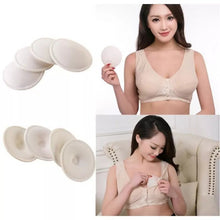 8Pc soft cotton nursing pads fitted inside a beige bra, washable breast pads for daily breastfeeding comfort.