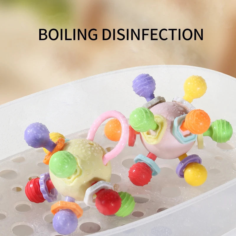 Two grasping balls in a tray with a boiling disinfection note
