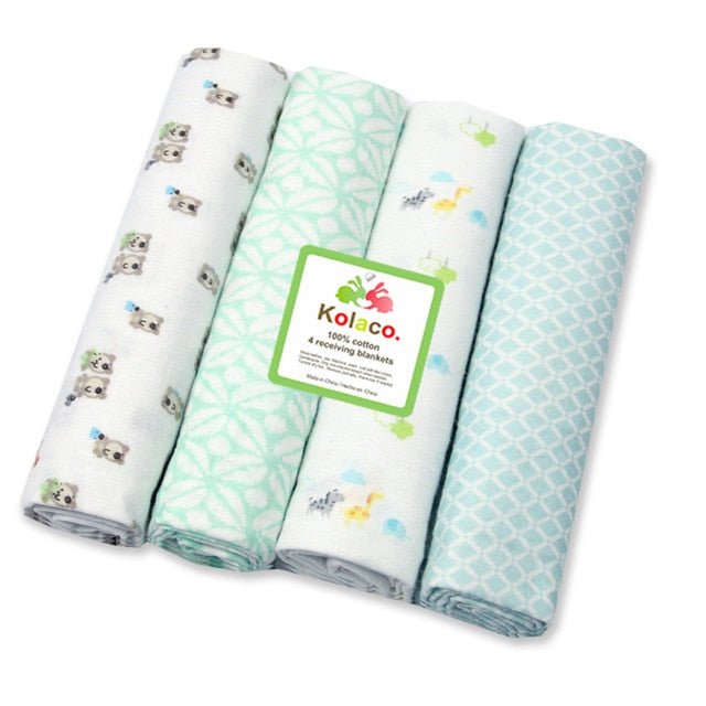Soft newborn muslin blanket set folded in a 4-pack, handy for swaddling, feeding cover-ups, and baby shower gifting.