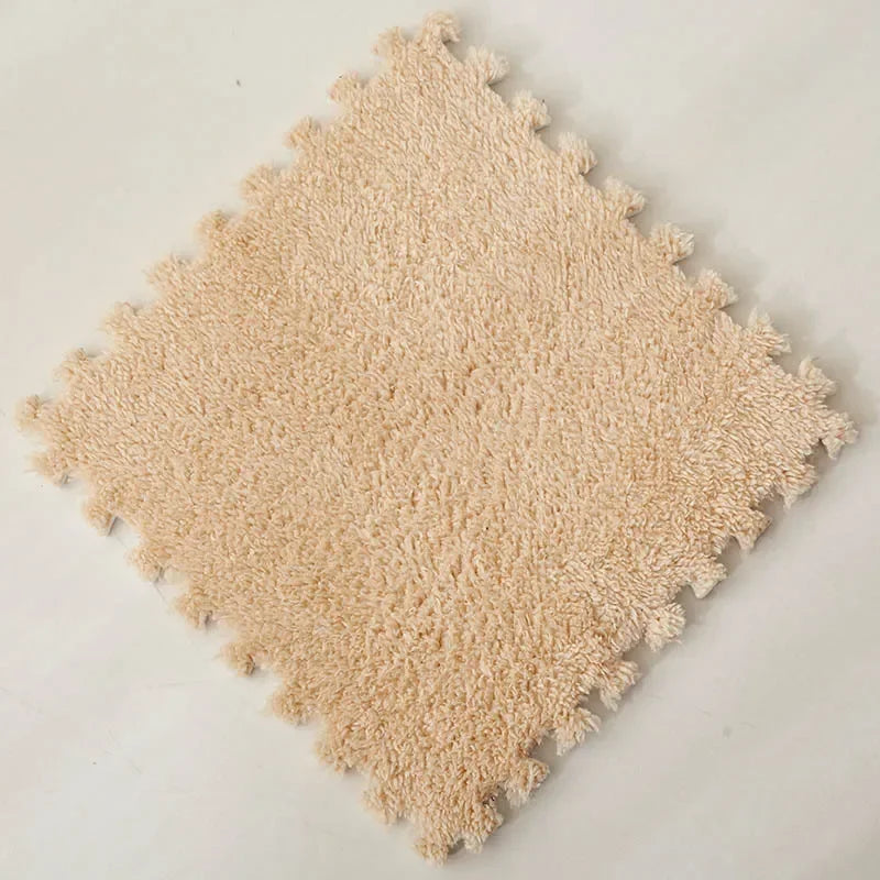 Beige interlocking foam rug tile.