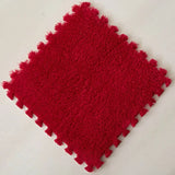 Red textured square mat.