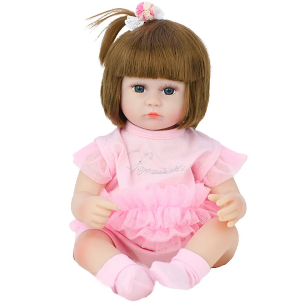 Doll with brown hair and a pink outfit on a white background