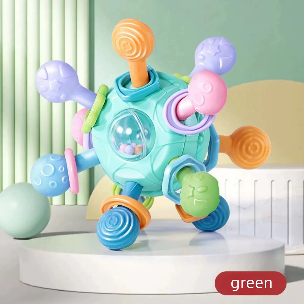 Green knobbed ball on a white podium labeled green, second view