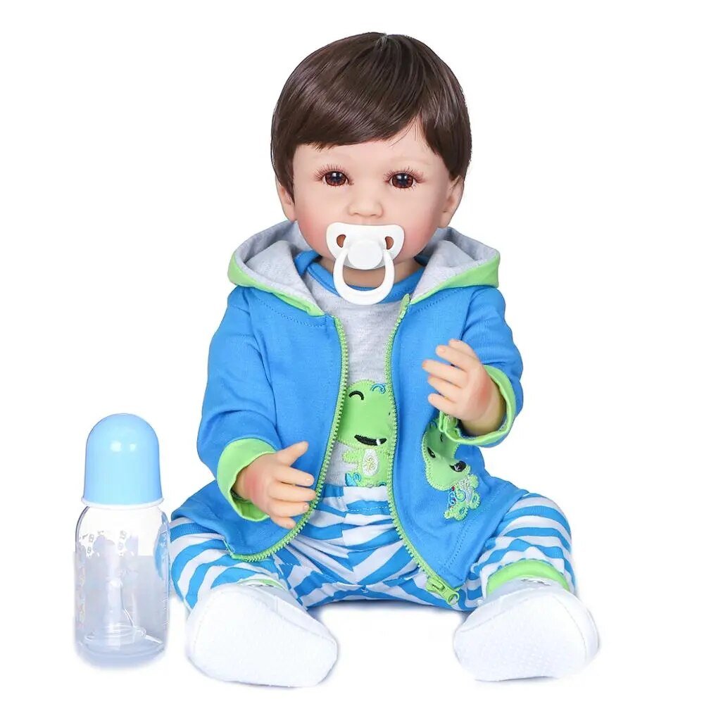 Soft silicone Reborn Baby Boy doll in a blue outfit with feeding bottle, a handmade lifelike doll for baby care role play.