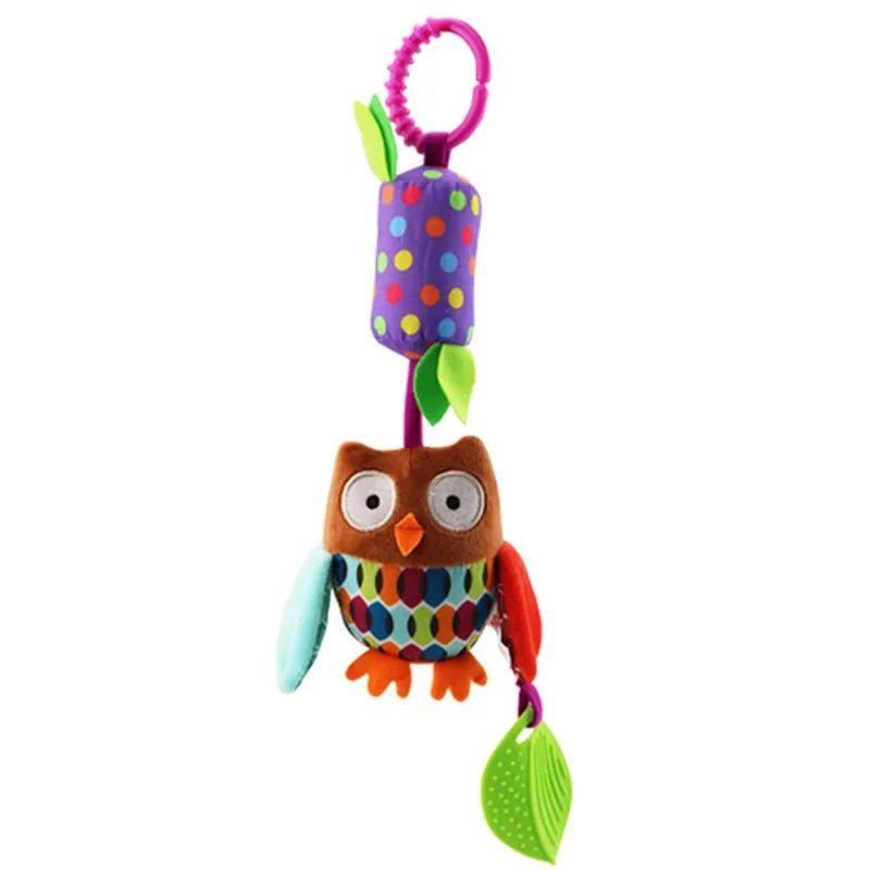 Colorful owl-shaped baby toy with polka dot elements.
